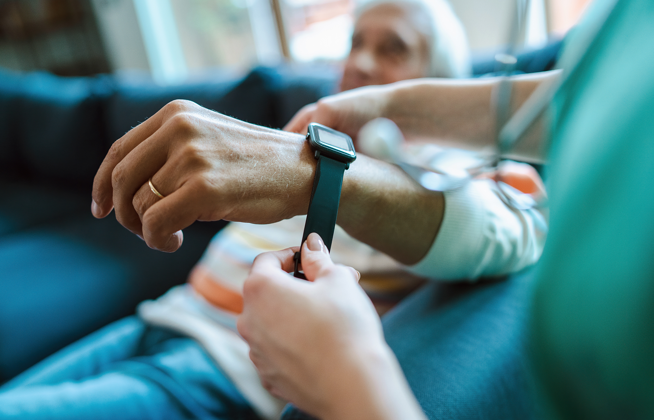 Smartwatch for assisted living. A woman from the medical health